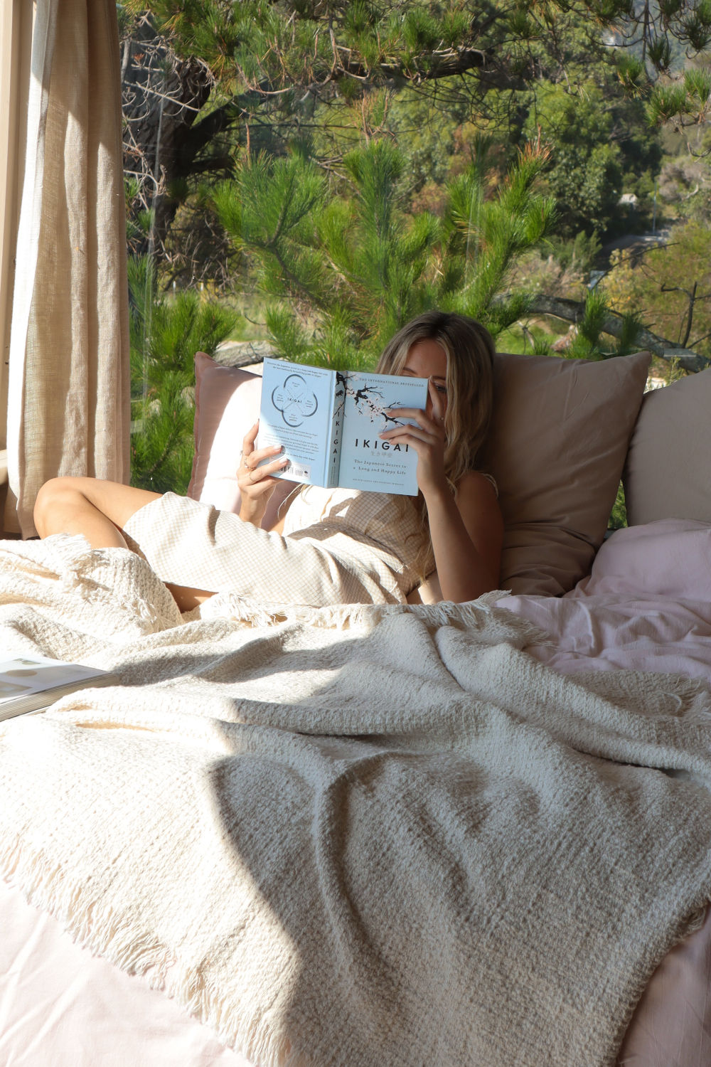 Lying in bed looking out over the ocean