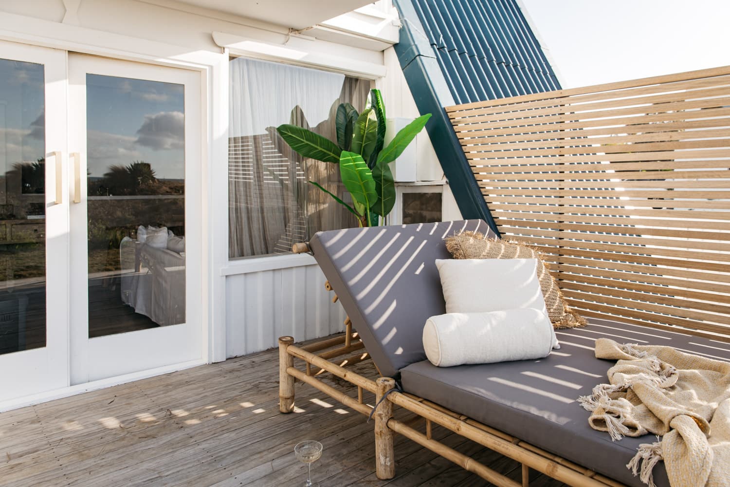 A daybed on the front deck